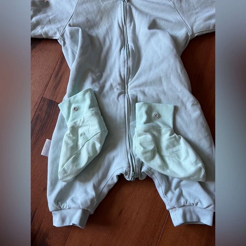 Sleep sack. 2 way zip. Snap on booties. Warm and cozy